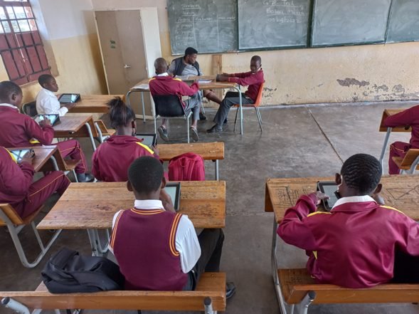 South African children using tablets in a classroom, developing digital skills